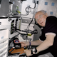 STS-95 payload specialist John Glenn in a locker in the Discovery’s middeck. (Image: NASA/JPL)